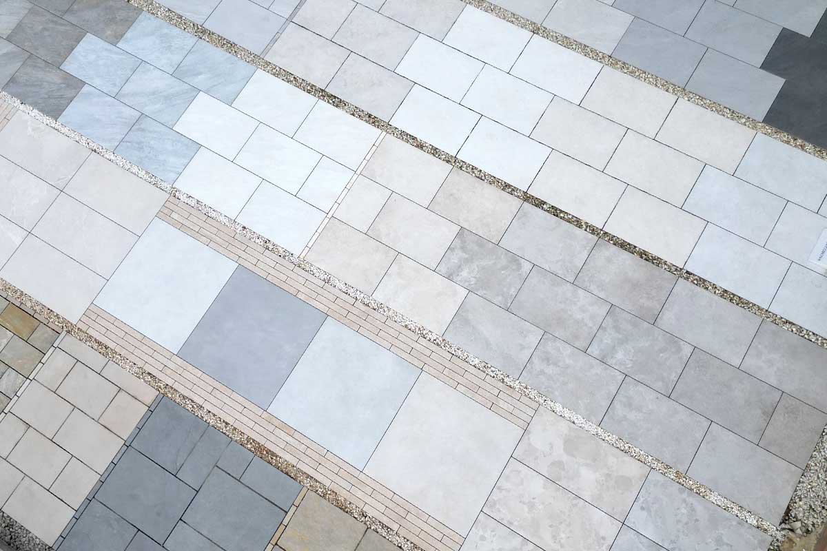 Aerial photograph of large displays of installed porcelain paving slabs outside the Love Stone showroom in Ewshot near Farnham