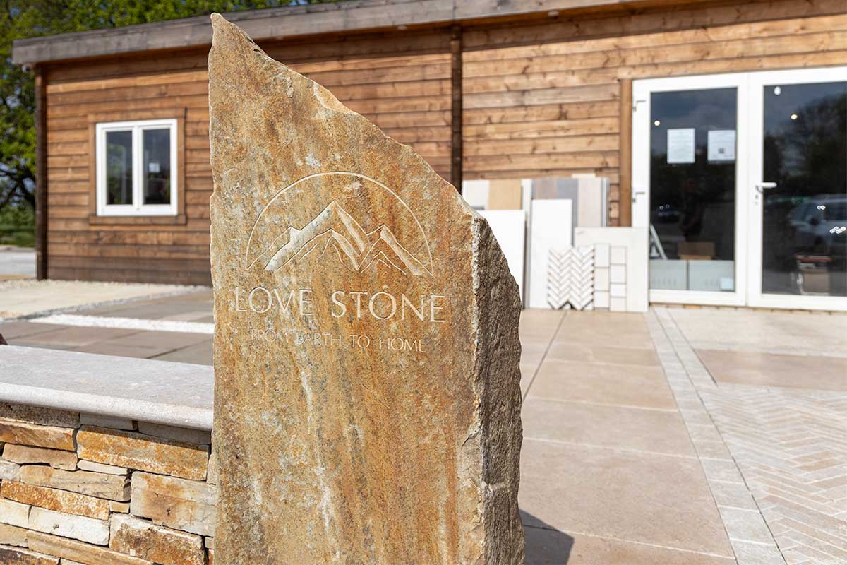 Monolith rock Love Stone sign at the entrance to the paving showroom and outdoor displays area at Ewshot in Hampshire
